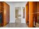 Large closet includes custom wood shelving and opens into bathroom with soaking tub and walk in shower at 900 Las Vegas Blvd # 1014, Las Vegas, NV 89101