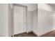 Hallway shot featuring a white front door with a circular design and a modern aesthetic at 900 Las Vegas Blvd # 1014, Las Vegas, NV 89101