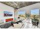 Bright living room with modern fireplace, plush seating, and expansive windows overlooking the city at 900 Las Vegas Blvd # 1014, Las Vegas, NV 89101