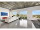 Bright and open floor plan with concrete ceilings, electric fireplace and sliding glass doors at 900 Las Vegas Blvd # 1014, Las Vegas, NV 89101
