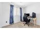 Bedroom features plush carpet, natural light, and space for a desk or study area at 9013 Meisenheimer Ave, Las Vegas, NV 89143