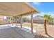 Shaded covered patio featuring gravel and concrete, ideal for outdoor relaxation at 9013 Meisenheimer Ave, Las Vegas, NV 89143