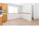 Eat-in kitchen space with wood cabinets, tile countertops, and natural light at 9013 Meisenheimer Ave, Las Vegas, NV 89143