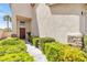 Covered front entrance with meticulously maintained landscaping and an inviting walkway at 9013 Meisenheimer Ave, Las Vegas, NV 89143