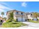 Exterior elevation with lawn and desert landscaping in front of a two story home at 9013 Meisenheimer Ave, Las Vegas, NV 89143