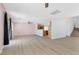 Expansive living area with modern flooring, a view of the kitchen, and ample space at 9013 Meisenheimer Ave, Las Vegas, NV 89143