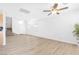 Bright living room featuring modern flooring and a neutral color palette, ideal for entertaining at 9013 Meisenheimer Ave, Las Vegas, NV 89143