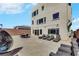 The backyard is spacious with lounge chairs and patio dining making it ideal for outdoor entertaining and relaxation at 9045 Knots Estate St, Las Vegas, NV 89139