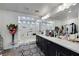 Spacious bathroom featuring a large vanity area, framed mirror, and glass-enclosed walk-in shower at 9045 Knots Estate St, Las Vegas, NV 89139