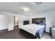 Comfortable bedroom with plush carpeting and ensuite bathroom at 9045 Knots Estate St, Las Vegas, NV 89139