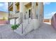 The exterior showcases contemporary architectural details, a stylish front entrance, and a well-maintained driveway and landscaping at 9045 Knots Estate St, Las Vegas, NV 89139