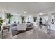 Bright living room with modern decor, marble floors, recessed lighting, and a view to other rooms at 9045 Knots Estate St, Las Vegas, NV 89139