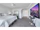 Spacious main bedroom featuring gray carpet and modern furniture at 9045 Knots Estate St, Las Vegas, NV 89139