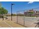 Enjoy a game on this fenced outdoor basketball court with mountain views, located within the community at 985 Via Lombardi Ave, Henderson, NV 89011