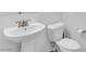 Clean half bathroom with pedestal sink at 985 Via Lombardi Ave, Henderson, NV 89011