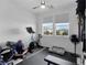 Dedicated home gym space with exercise bike and free weights at 985 Via Lombardi Ave, Henderson, NV 89011