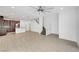 Open floor plan featuring tile floors, a staircase, and a spacious area for entertaining at 985 Via Lombardi Ave, Henderson, NV 89011