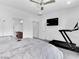 Bright main bedroom with exercise equipment, ceiling fan, and ample space at 985 Via Lombardi Ave, Henderson, NV 89011