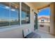 Cozy balcony featuring an outdoor seating area and views of the neighborhood at 9901 Trailwood Dr # 2109, Las Vegas, NV 89134