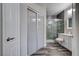 Modern bathroom features a glass shower, double sinks, and stylish vanity with good lighting at 9901 Trailwood Dr # 2109, Las Vegas, NV 89134