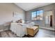 Bright bedroom boasts wood floors, a window with natural light and decor to give a welcoming and homey feel at 9901 Trailwood Dr # 2109, Las Vegas, NV 89134