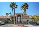 Exterior of community center featuring nice desert landscaping and mature trees at 9901 Trailwood Dr # 2109, Las Vegas, NV 89134