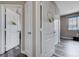 Hallway with multiple doors and stylish white trim at 9901 Trailwood Dr # 2109, Las Vegas, NV 89134