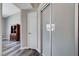 Hallway featuring modern wood floors and neutral paint tones showcasing clean and open living at 9901 Trailwood Dr # 2109, Las Vegas, NV 89134