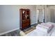 Cozy main bedroom with beautiful decor and view into ensuite bathroom at 9901 Trailwood Dr # 2109, Las Vegas, NV 89134