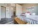 Relaxing main bedroom featuring natural light and ensuite bathroom entrance at 9901 Trailwood Dr # 2109, Las Vegas, NV 89134