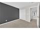 Bedroom with a dark accent wall, plush carpeting, and closet at 10029 Cluny Ave, Las Vegas, NV 89178