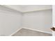 Walk-in closet featuring neutral walls, plush carpeting, and ample storage space at 10029 Cluny Ave, Las Vegas, NV 89178