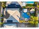 Aerial view showcasing the home's private backyard oasis with pool, spa, putting green, and cabana at 10084 Terrastone Dr, Las Vegas, NV 89148
