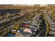 Daytime aerial view showing location of home, nearby streets and community amenities at 10084 Terrastone Dr, Las Vegas, NV 89148