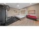 Large exercise room with full equipment and a murphy bed for guests at 10084 Terrastone Dr, Las Vegas, NV 89148