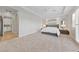 Spacious bedroom with plush carpet, ensuite bath, and a peaceful atmosphere at 10084 Terrastone Dr, Las Vegas, NV 89148