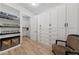 Bright mud room boasts custom storage cabinets and organizers, perfect for streamlined living at 10084 Terrastone Dr, Las Vegas, NV 89148