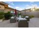 A stylish outdoor seating area is perfect for entertaining and relaxation at 10084 Terrastone Dr, Las Vegas, NV 89148