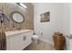 Stylish powder room with unique wall tiles, modern fixtures, and designer touches at 10084 Terrastone Dr, Las Vegas, NV 89148