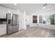 Spacious kitchen with stainless steel appliances and ample counter space, perfect for cooking at 10244 Amber Hue Ln, Las Vegas, NV 89144