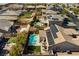 Aerial view showcasing a refreshing pool and patio area with solar panels on the roof at 10417 Artful Stone Ave, Las Vegas, NV 89149