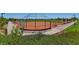 Well-maintained baseball field with fencing, benches, and a scenic mountain backdrop at 10417 Artful Stone Ave, Las Vegas, NV 89149
