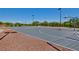 Outdoor basketball court featuring clean lines, lighting, and ample space for games at 10417 Artful Stone Ave, Las Vegas, NV 89149