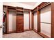 Walk-in closet with custom shelving and ample storage space at 10417 Artful Stone Ave, Las Vegas, NV 89149