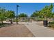 Inviting dog park area with secure fencing, play structures, and landscaping at 10417 Artful Stone Ave, Las Vegas, NV 89149