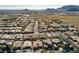 Scenic view of a well-maintained neighborhood with desert landscape and distant mountains at 10417 Artful Stone Ave, Las Vegas, NV 89149