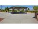 Covered picnic area with multiple tables offering an ideal space for community gatherings at 10417 Artful Stone Ave, Las Vegas, NV 89149