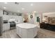 Bright kitchen boasts large island and easy flow to living area at 10754 Balmoral St, Las Vegas, NV 89141