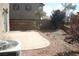 Property featuring a private backyard with decorative rock and patio at 1158 Gecko Rd, Henderson, NV 89002