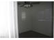 Bright bedroom with a ceiling fan and plantation shutters at 1158 Gecko Rd, Henderson, NV 89002